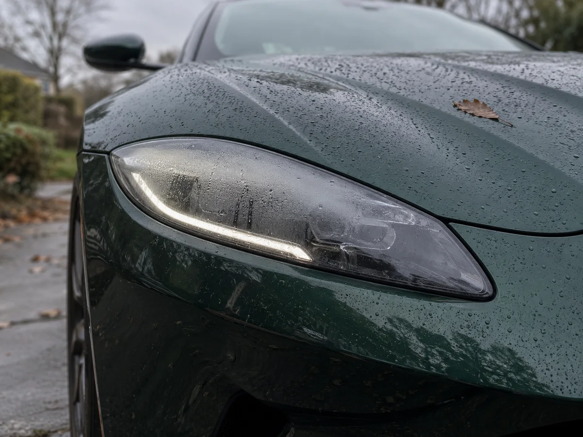 Condensation fogging the inside of an Aston Martin Vantage headlight lens