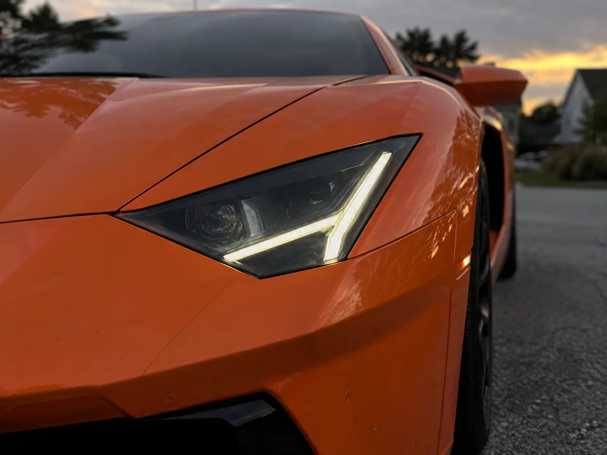 Close-up of a Lamborghini LED headlight with its daytime running light on