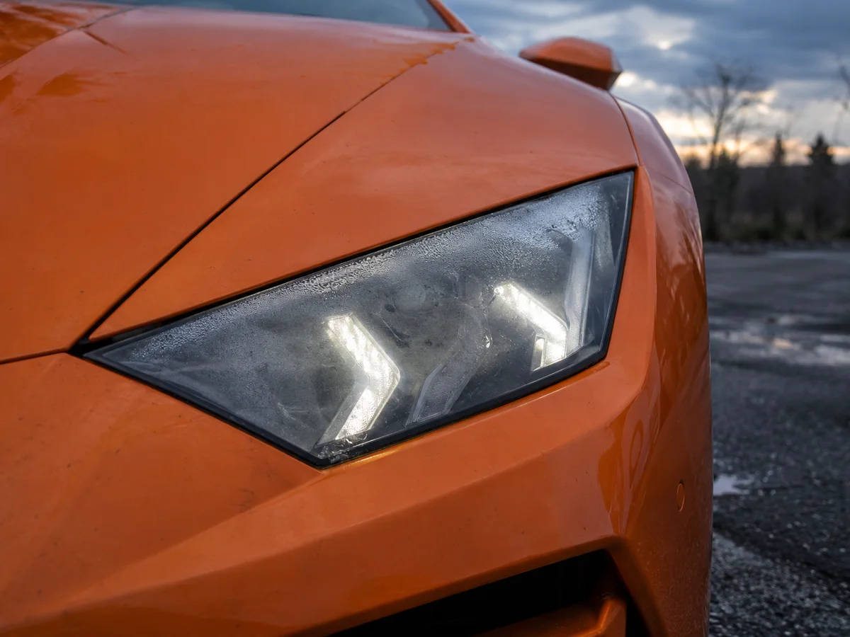 Huracán LED headlight with fog on the inside of the lens and one daytime light segment dark