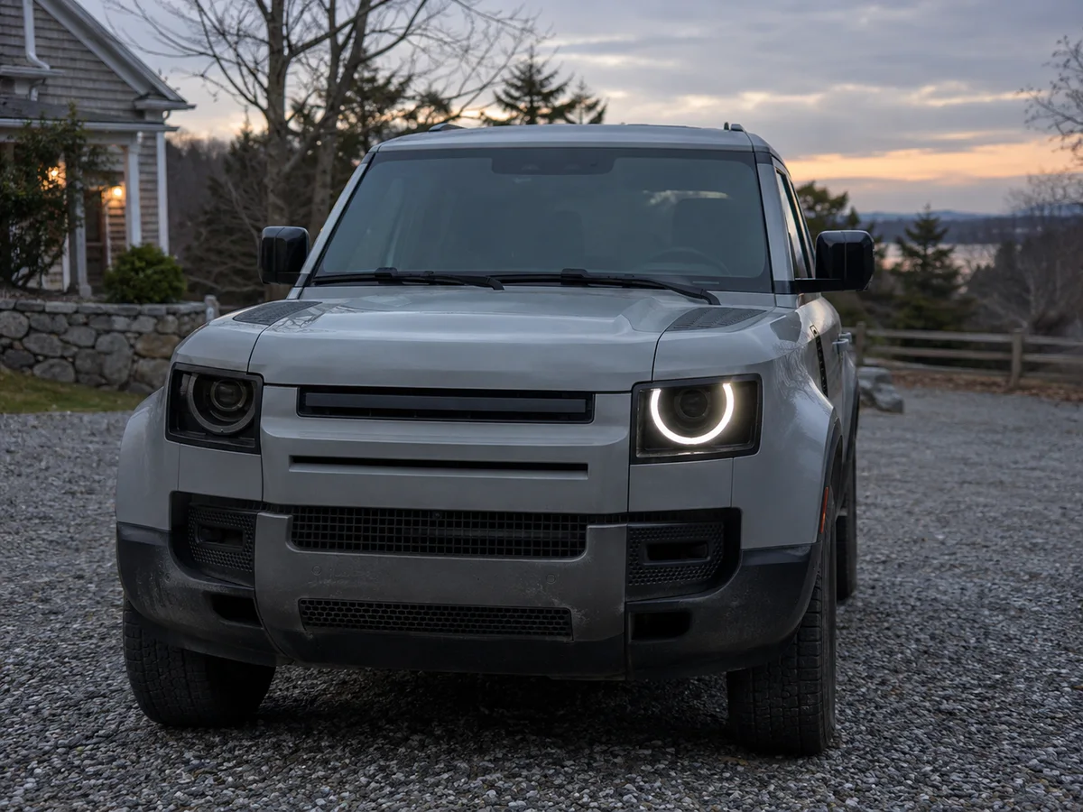Land Rover Defender at dusk with the daytime running light ring dark on the passenger side