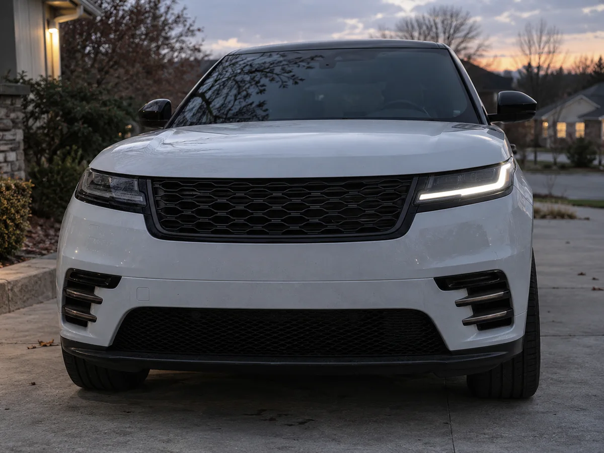 Velar at dusk with the LED daytime running light dark on the passenger side
