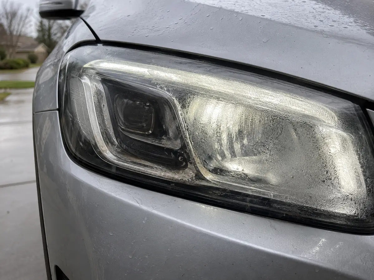 GLC LED headlight with condensation inside the lens and a dark section on the inner edge